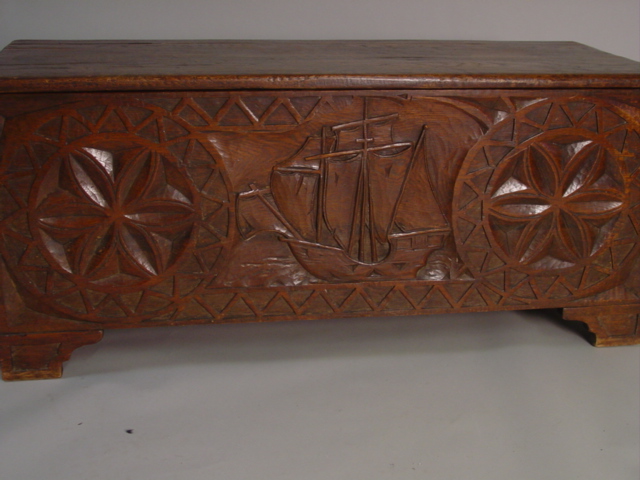 19th c. hand carved chest w. ship motif front