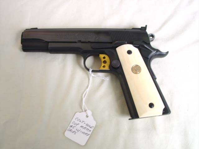Colt .45 Mark IV series 70 w ivory grips