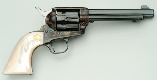 Colt SAA 45 cal 5 12 barrel, mother of pearl grips. From Colt Custom Gun Shop.jpg