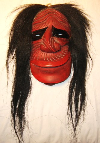 Circa 1900 Iroquois false face mask with long black horse hair.