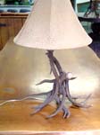 Antler lamp with hog skin shade
