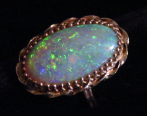 14kt 7ct. opal ring-21.2x13.5x5 mm