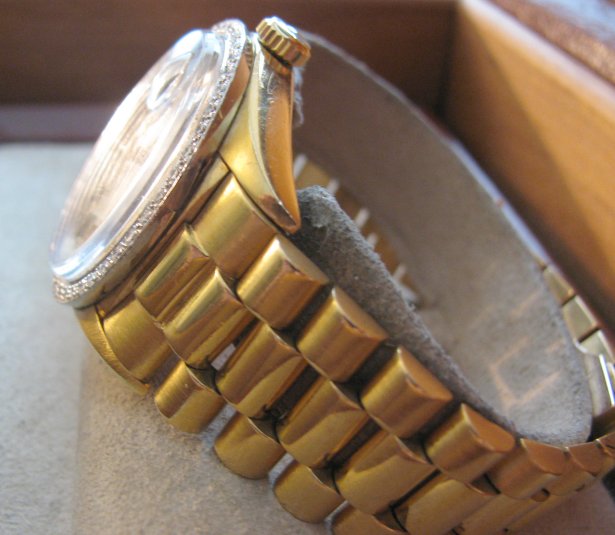 18k. Rolex President w. 2 ct.t.w. diamond side