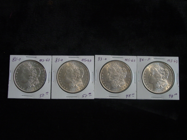 4 Silver Dollars - 2 1883's, 1885, 1886