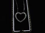 14kt Ladies white gold heart pendant w 40 diamonds